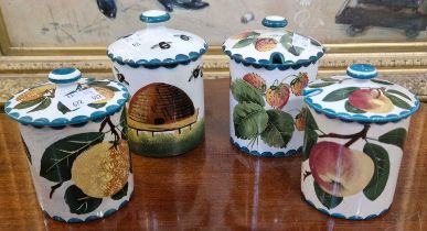 Four assorted Wemyss pottery preserve jars and covers, to include Bee and Hive pattern 12.5cm