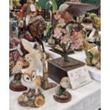 A group of five model bird figures comprising a limited edition Albany fine china model of a Jay,