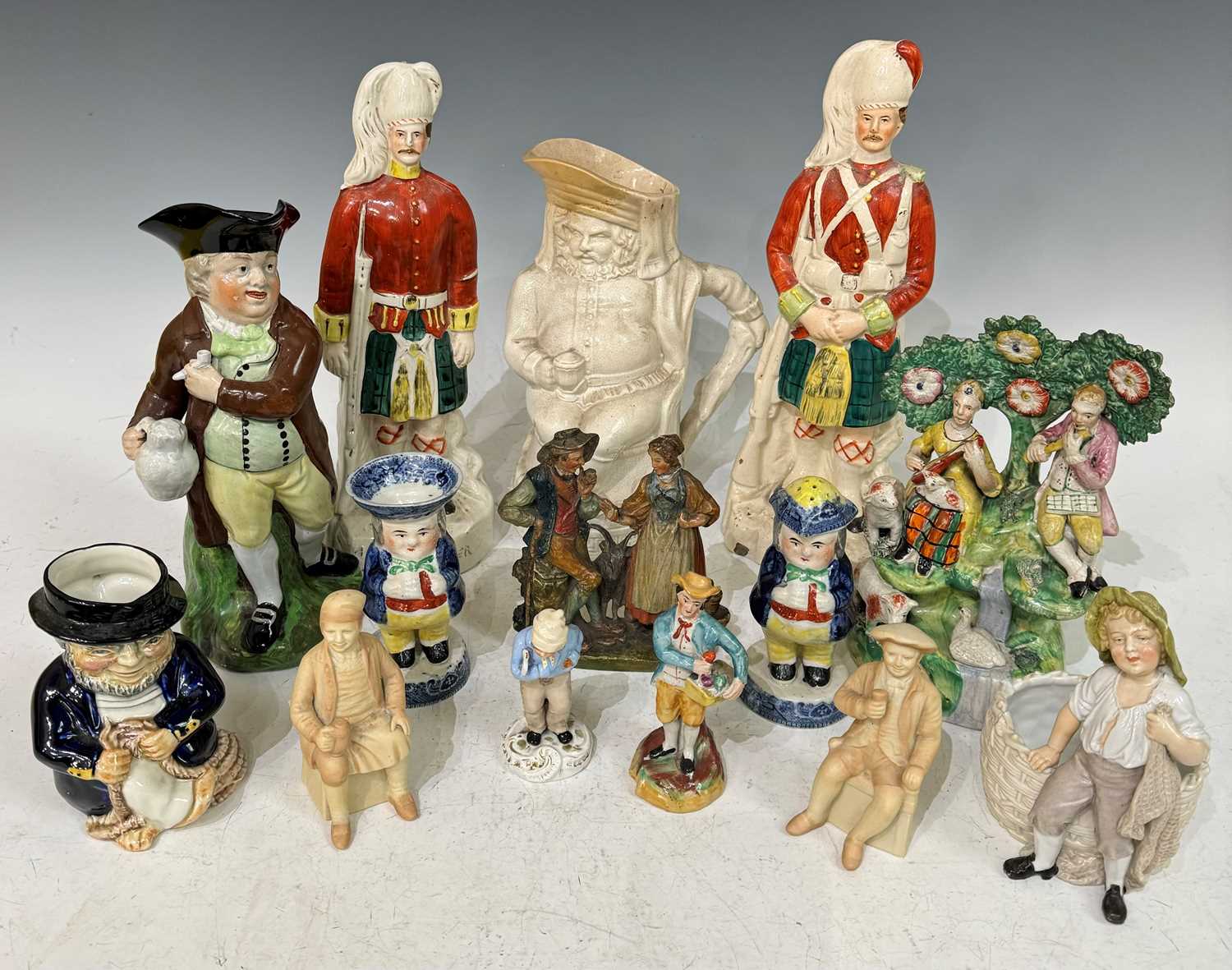 A group of 19th century and later porcelain and ceramics to include a 19th century Pearlware Toby
