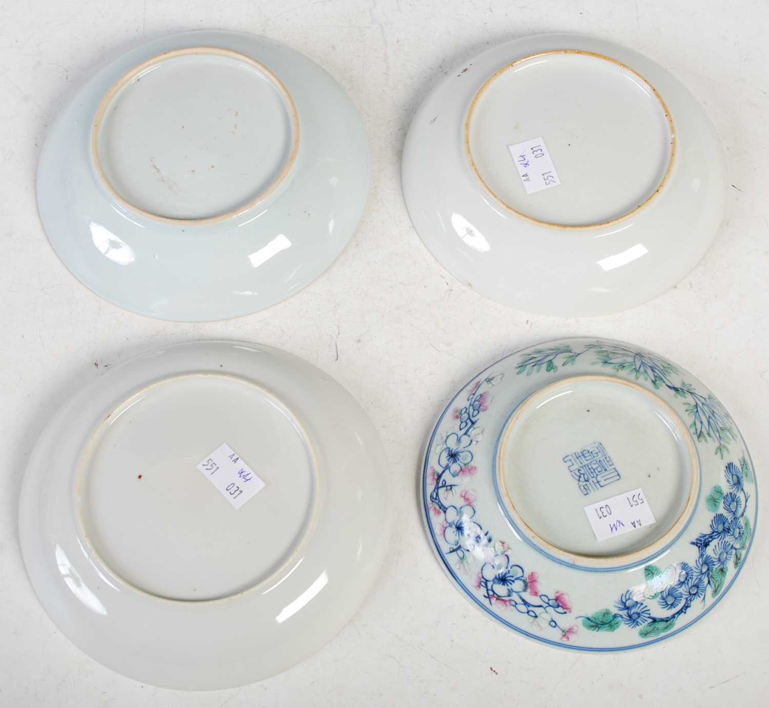 A collection of four assorted Chinese porcelain saucer dishes, Qing Dynasty, one decorated with - Image 6 of 7