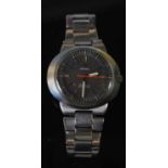 A vintage Gentleman’s Omega Dynamic bracelet wristwatch, the dial with baton numerals and orange