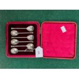 A cased set of six George V silver seal top teaspoons, Sheffield 1910.