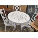 A white-painted cast metal garden table and three chairs, the table 81cm diameter.