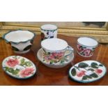 A collection of Wemyss pottery to include cup and saucer, decorated with dog roses, oval dish