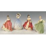 A group of four Royal Doulton lady figures comprising, Fair Lady HN 2835, Fair Lady HN 2193,
