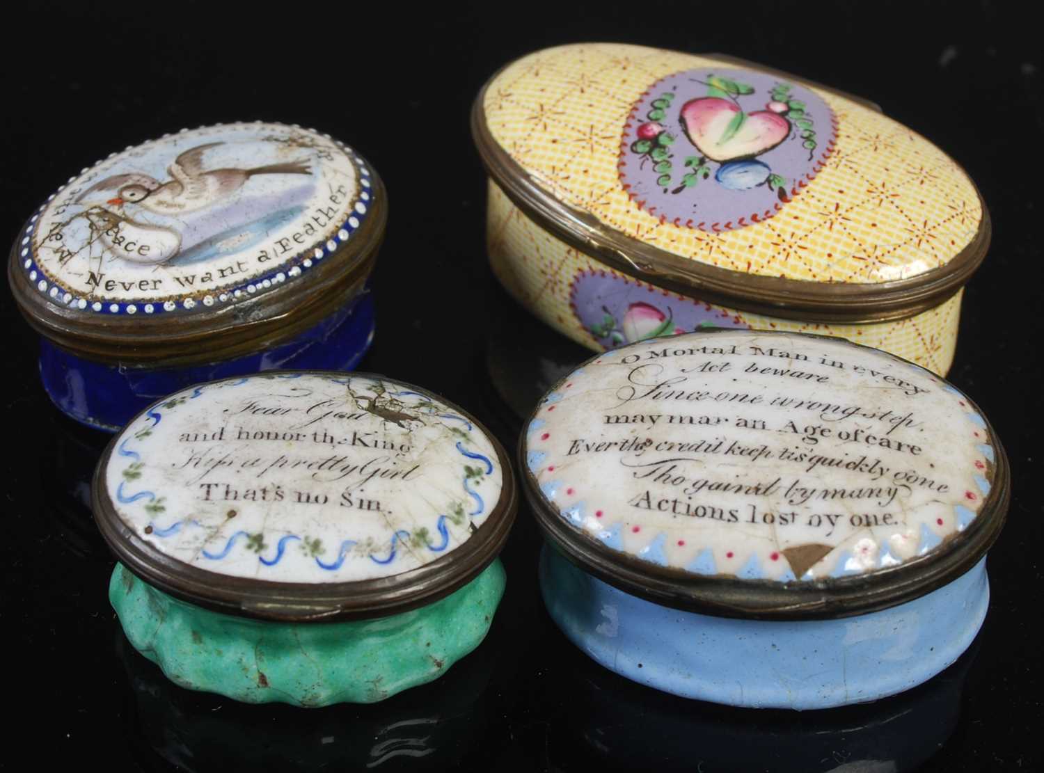 Three assorted 18th century English enamel snuff boxes to include a blue ground box with hinged