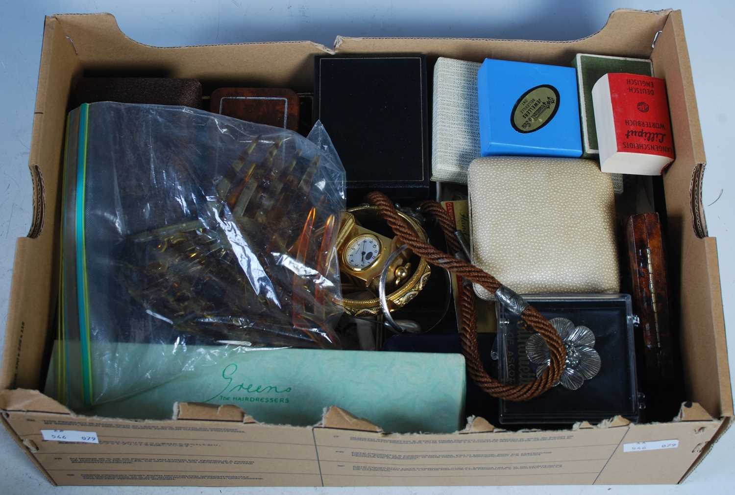 A box of assorted of assorted costume jewellery.