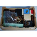 A box of assorted of assorted costume jewellery.
