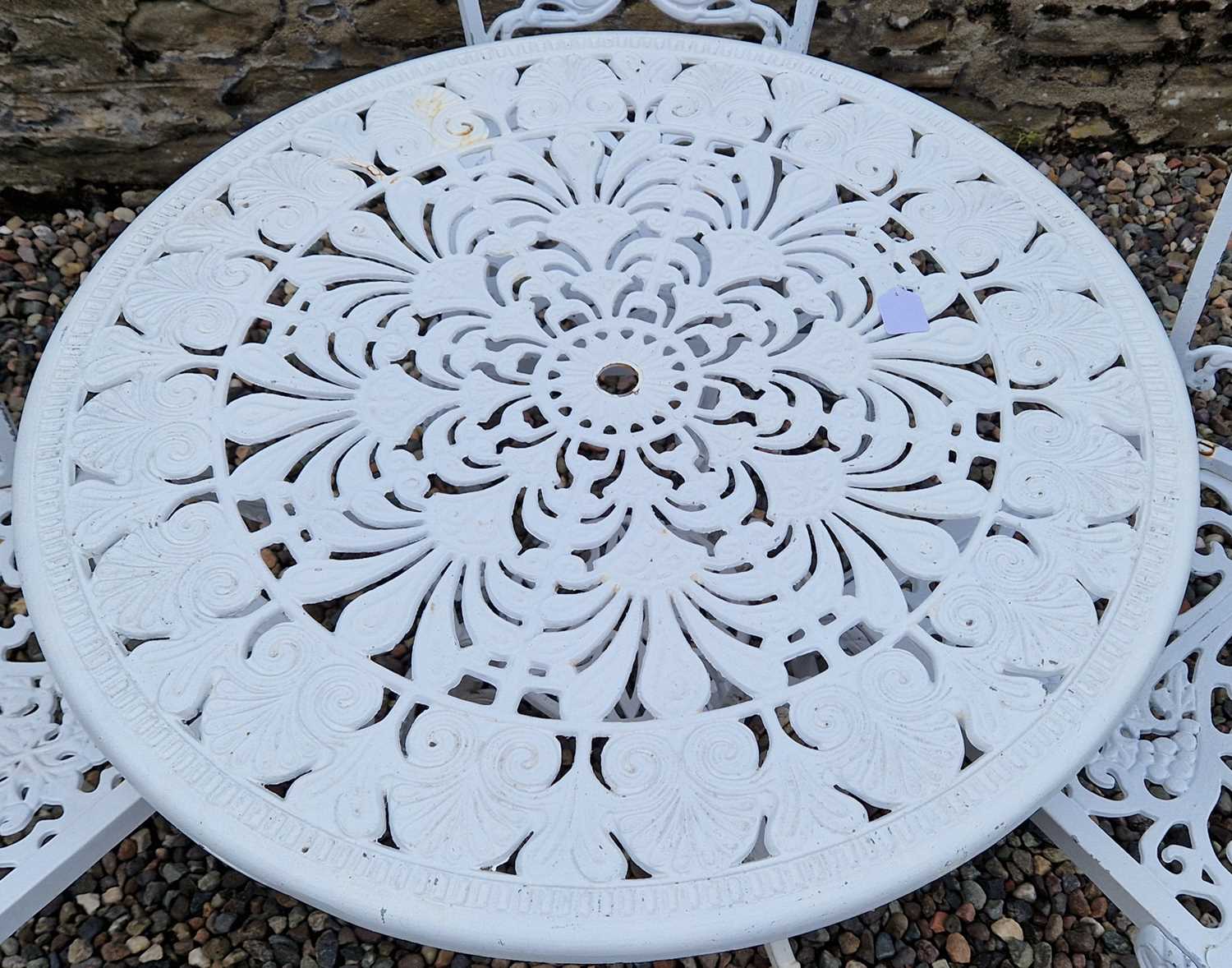 A white-painted cast metal garden table and three chairs, the table 81cm diameter. - Image 2 of 5