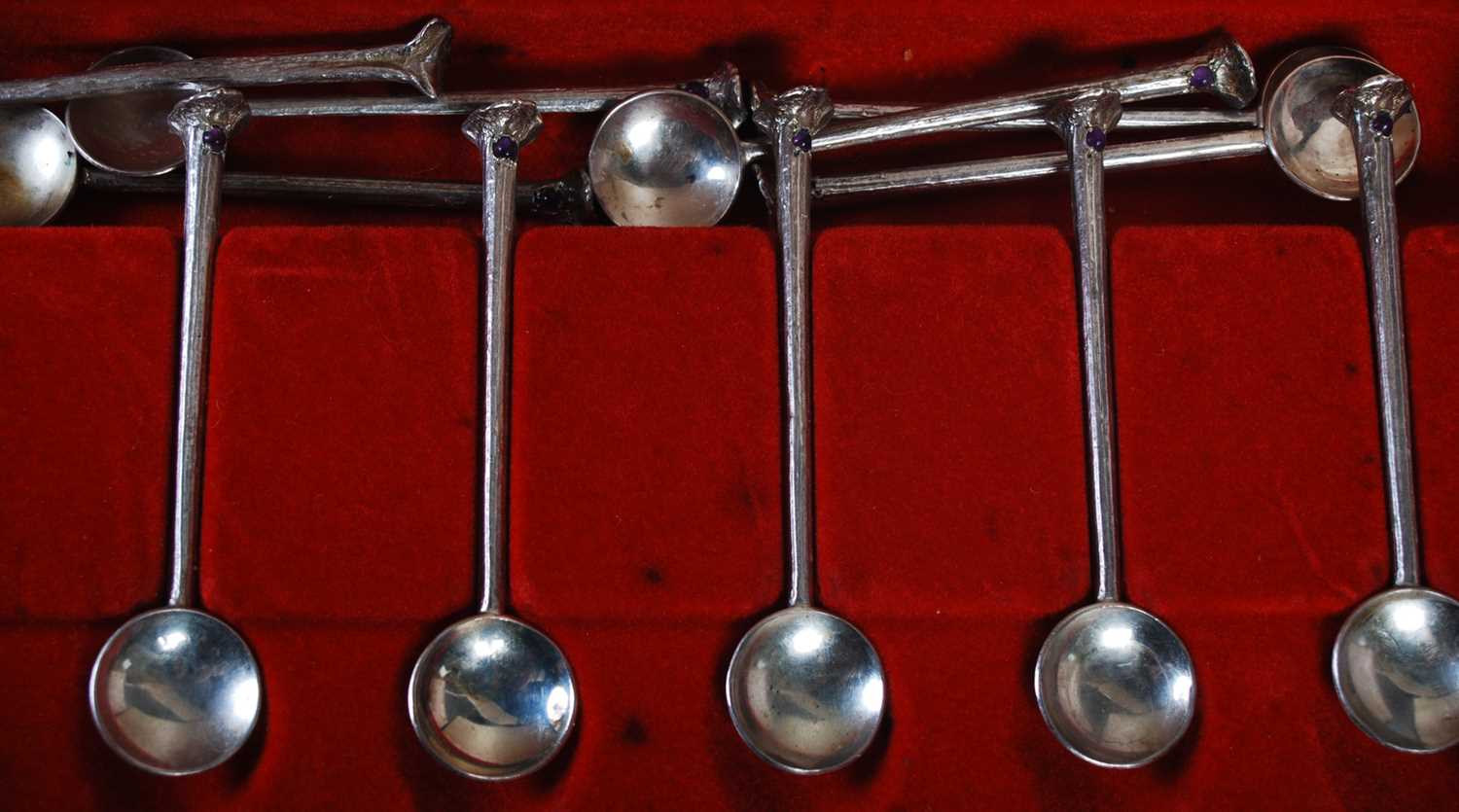 A cased set of six 20th century silver thistle topped teaspoons, Birmingham, 1975, together with a - Image 2 of 3