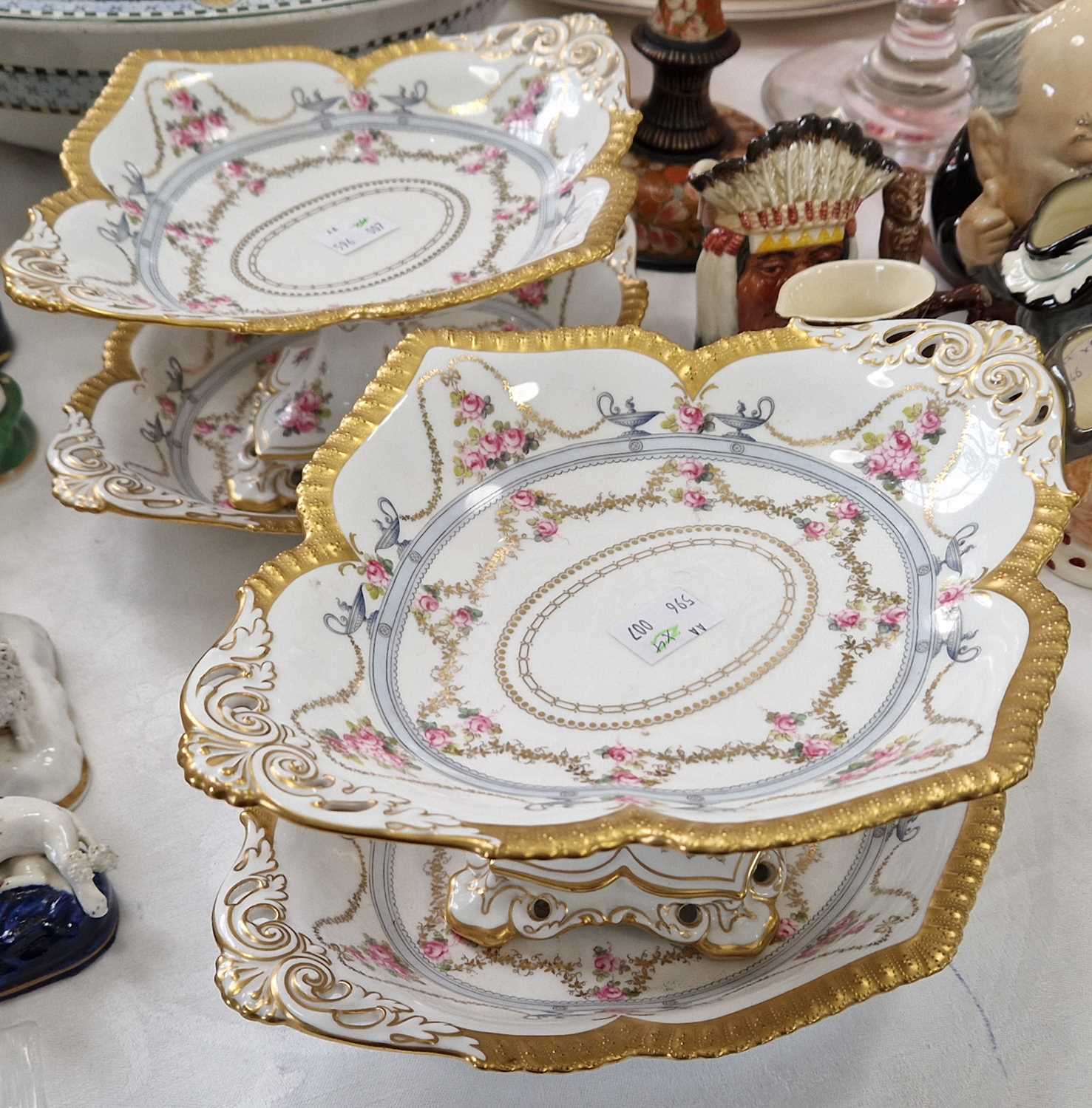 Four pieces of Royal Crown Derby comprising two lozenge comports and matching lozenge shaped dishes,