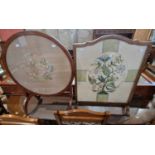 A vintage needlework upholstered fire screen, together with a needlework upholstered circular fire