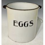 Kitchenalia - A large early 20th century white enamelled EGGS bin with C shaped carry handles,