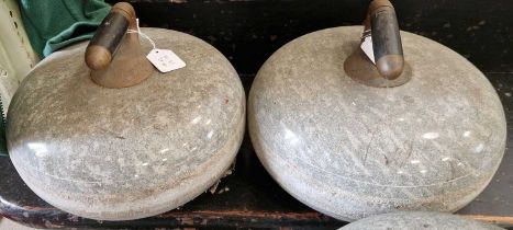 A pair of granite curling stones.