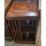 A reproduction mahogany inlaid square revolving bookcase, 79cm high.