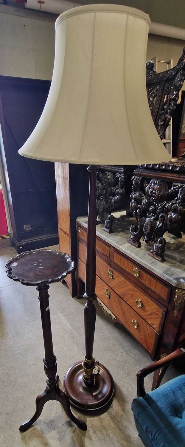 A mahogany torchere and a mahogany standard lamp and shade.