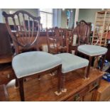 A pair of mahogany shield back bedroom chairs together with an Edwardian marquetry inlaid bedroom