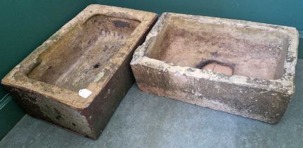 Two antique composite garden planters of rectangular form, 62cm wide and 59cm wide.