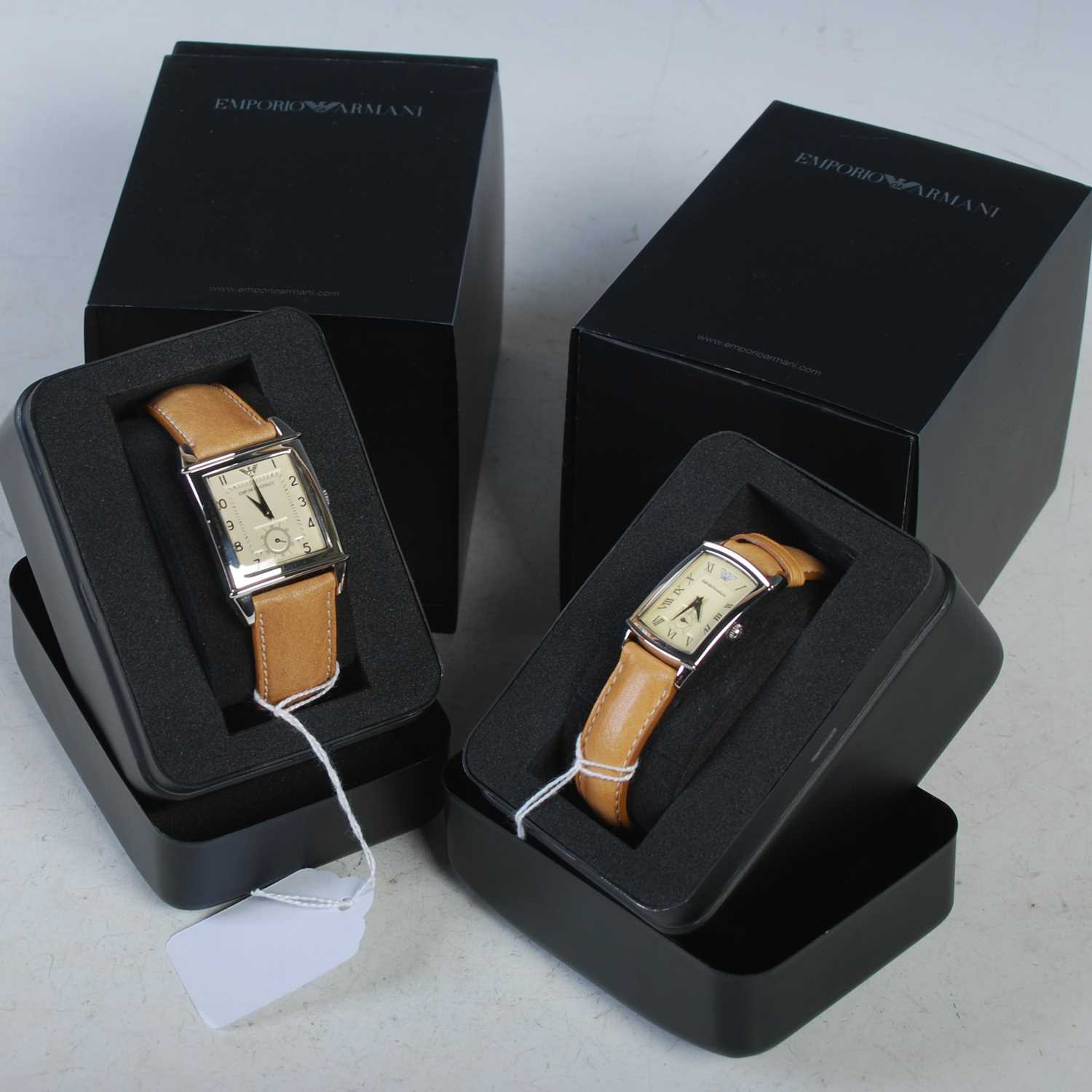 Emporio Armani, a gentlemans and ladies pair of wristwatches, the gentlemans watch with Arabic