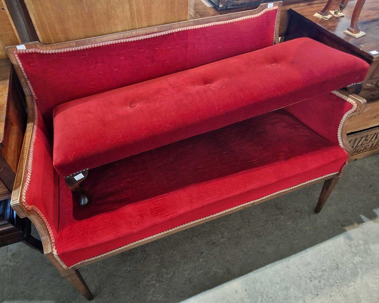An Edwardian mahogany and satin wood banded red velvet upholstered sofa, 118cm wide together with