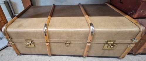 A vintage 'Viking travelling trunk', with wood and brass bound details, containing two vintage
