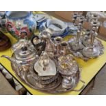 A large collection of assorted EP ware to include three piece tea set; twin-handled tray; pair of