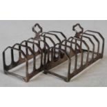 A pair of Edward VIII silver seven bar toast racks, Sheffield 1936, makers mark E.V, 11cm long,