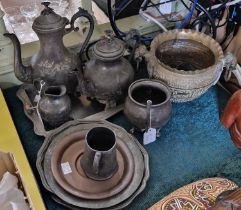 A collection of mainly pewter ware to include a serving tray with four cabochons, four piece teaset,