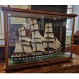A model ship in glass display case 'Yallum', 80 cm wide x 56cm high.