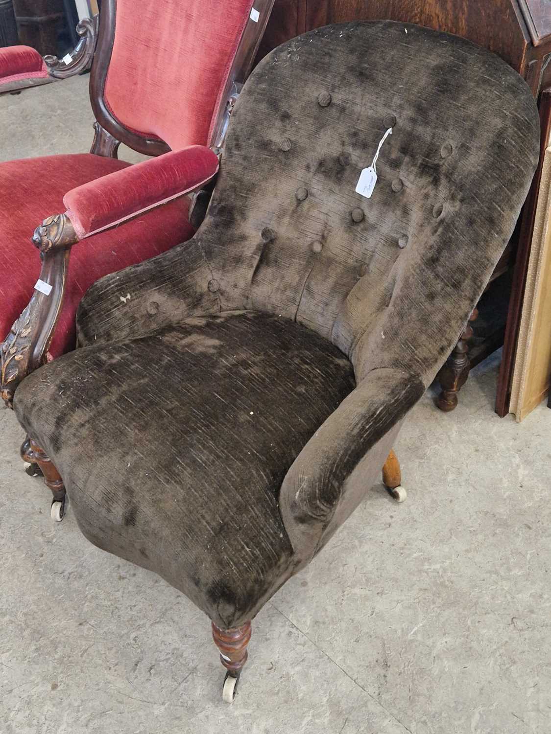 A Victorian mahogany brown velvet upholstered slipper chair.