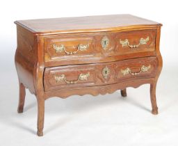 A mid-18th century French Provincial cherrywood bombe commode, the rectangular top with serpentine