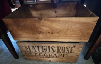 Two wine crates, one for Mateus Rose, Porto, the other Douvres.