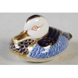 A Royal Crown Derby model of a duck with gold-coloured button, 11.5cm long.