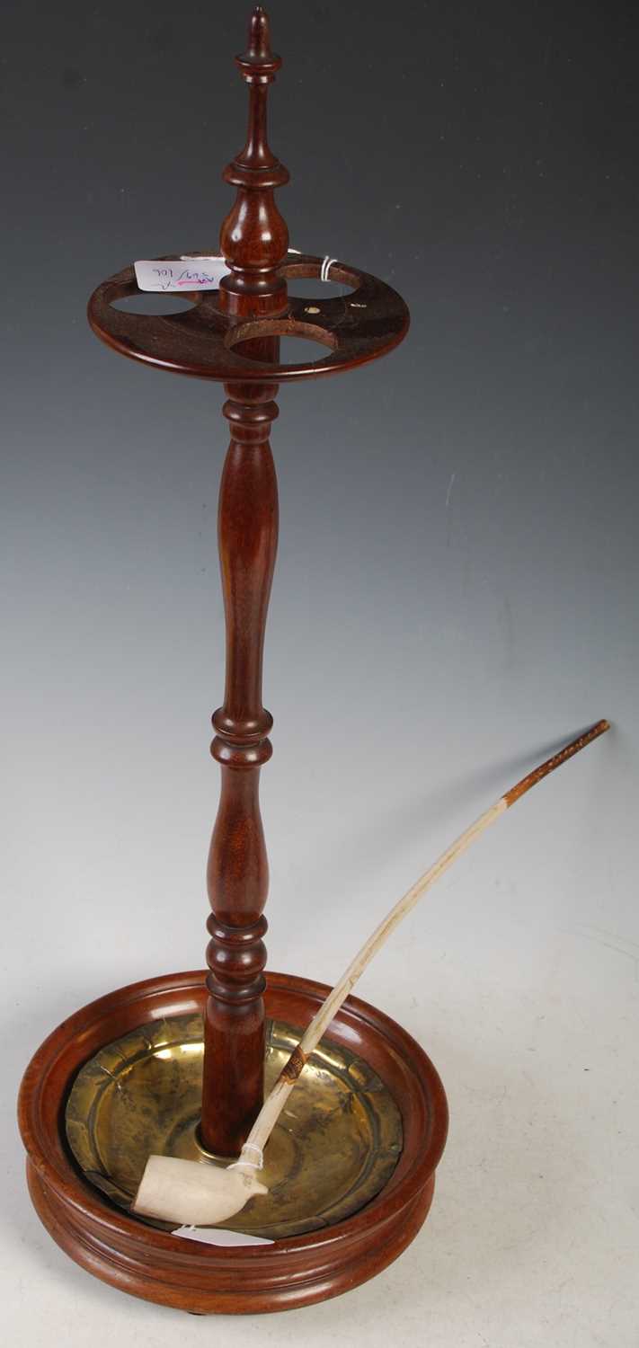 A 19th century mahogany Dutch church wardens pipe stand with brass liner together with a Goedewaagen
