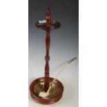 A 19th century mahogany Dutch church wardens pipe stand with brass liner together with a Goedewaagen