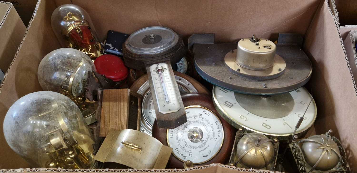 A box of assorted clocks and barometers to include two lantern clocks, three mantle clocks under