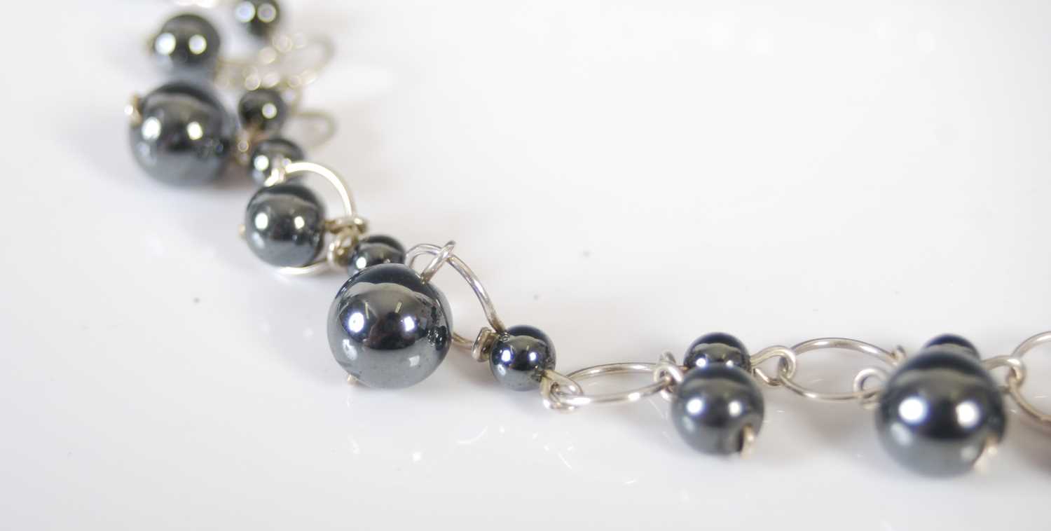 A silver and pearl necklace together with a matching pair of earrings, necklace 45cm long, gross - Image 2 of 3