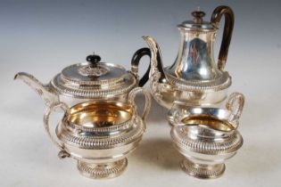 A George V four piece silver tea and coffee set, London 1919, makers mark C S Harris & Sons.,