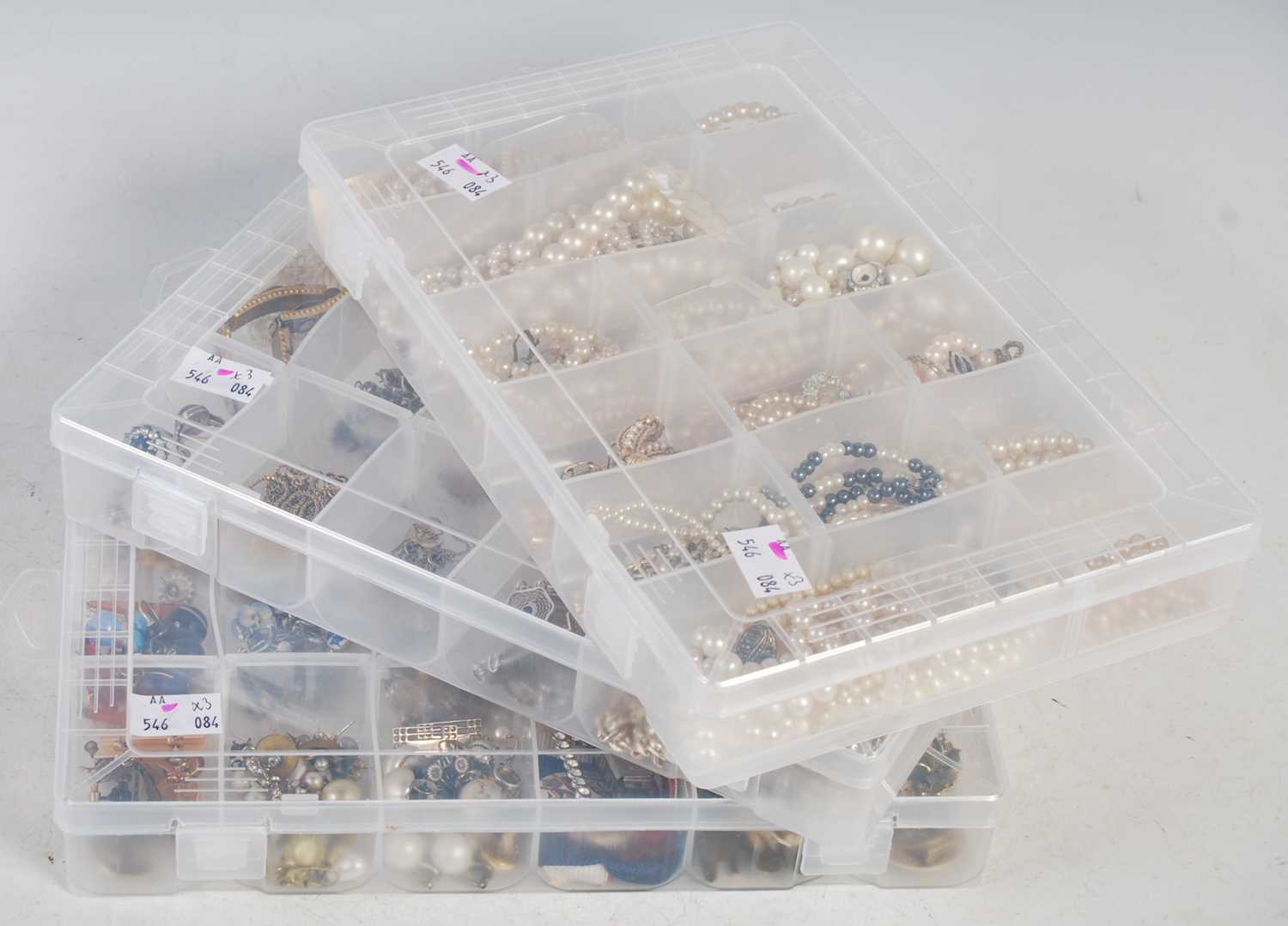 Three boxes of assorted costume jewellery to include pearl necklaces, assorted bracelets,