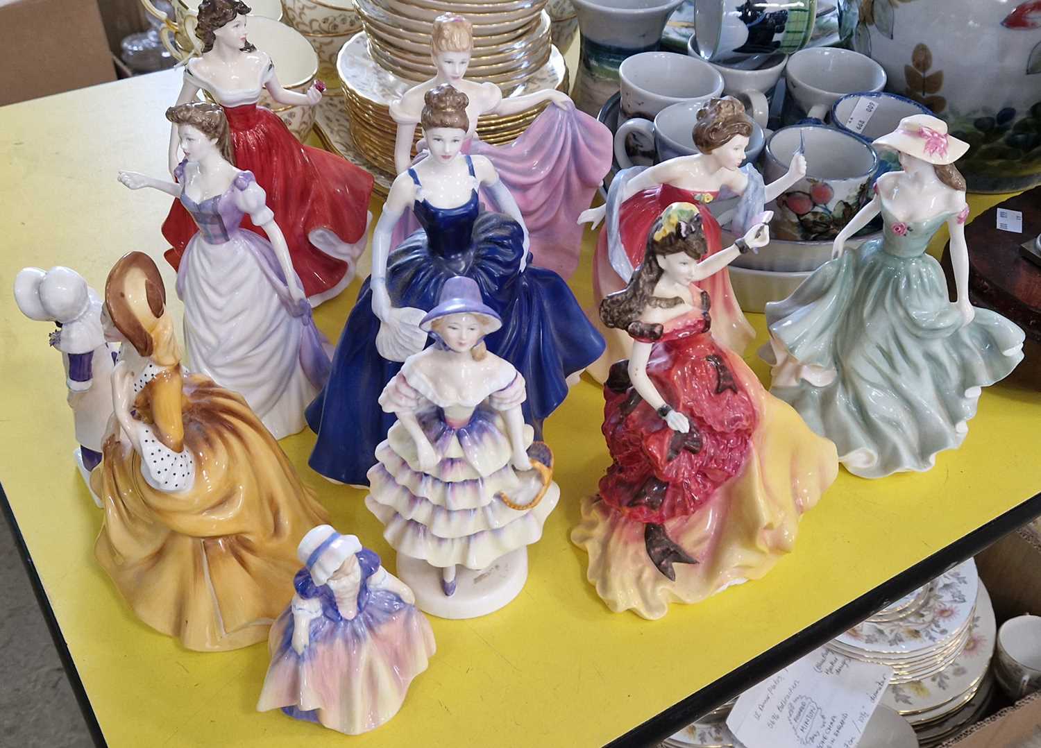 A collection of eleven Royal Doulton lady figures comprising; Anna HN 28.., Dinky Do HN 1678, Meg HN