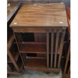 An early 20th century mahogany square revolving bookcase, 84cm high.