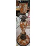An antique Kashmiri ware hand painted candlestick, 30cm high.