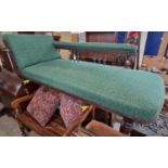 A Victorian oak chaise longue with green upholstered back, arm and seat, with brass studded