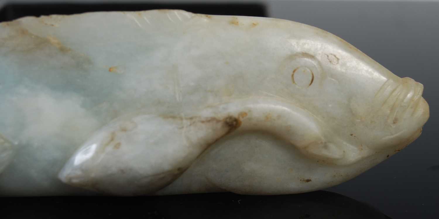 A Chinese jade model of a fish and fingerlings, 12cm long, 84.6 grams. - Image 2 of 2