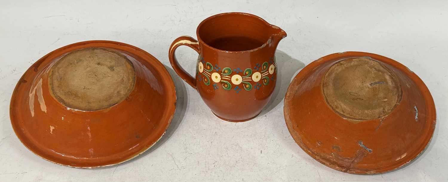 Three pieces of antique terracotta glazed clay pottery comprising a Kashubian style pottery jug - Image 2 of 2
