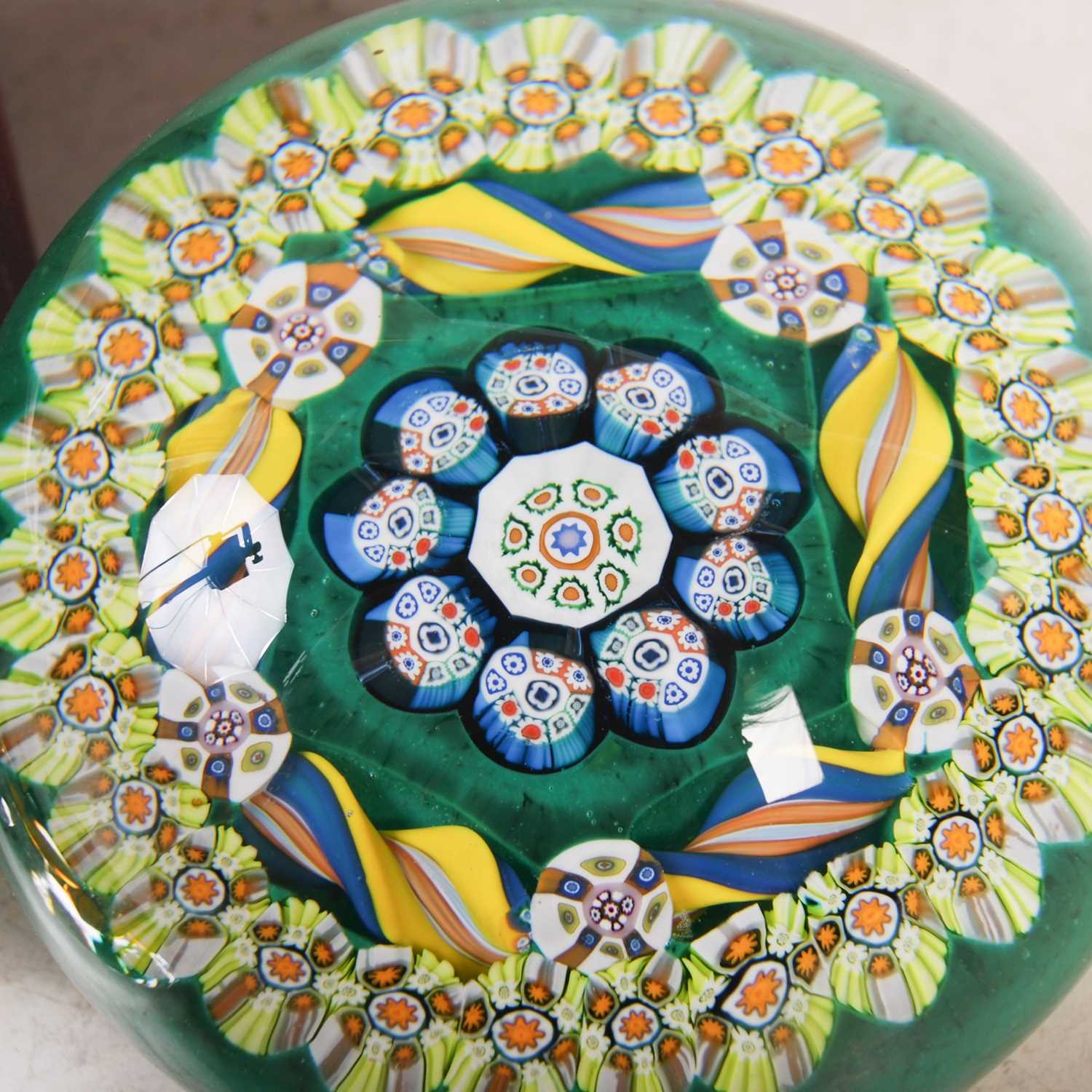 Three assorted millefiori glass paperweights to include a green ground weight by Jack Allen, - Image 3 of 4