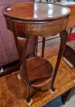 An early 20th century mahogany jardinere stand, 76cm high x 35 cm diameter.