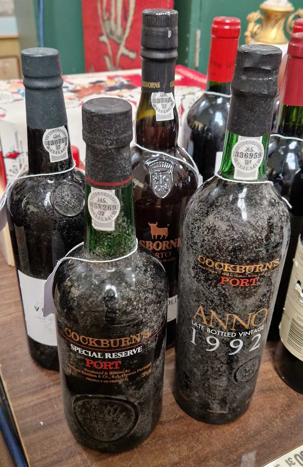 Four bottles, a Cockburn's special reserve port, 75cl, a Cockburn's port Anno late bottled