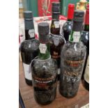 Four bottles, a Cockburn's special reserve port, 75cl, a Cockburn's port Anno late bottled