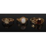 Three assorted 9ct gold gem set rings, gross weight 5.8 grams.